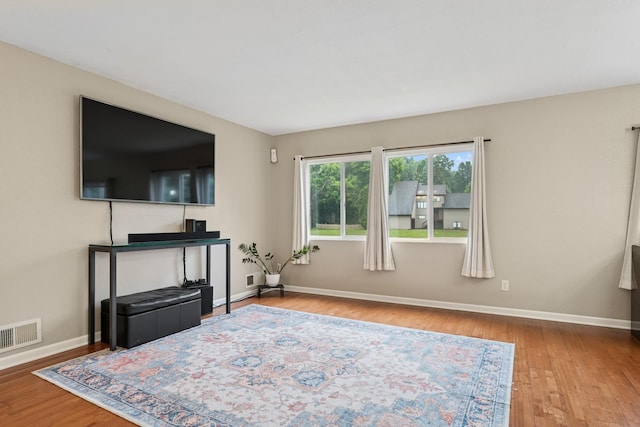 13967 Herald Ct, Apple Valley, MN 55124 - living room with baseboards and wood finished floors