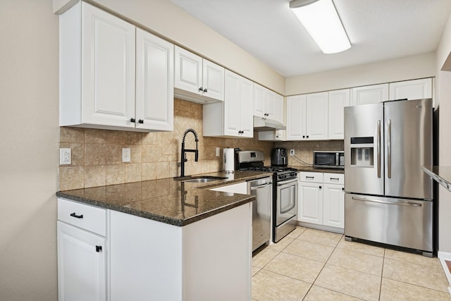 13967 Herald Ct, Apple Valley, MN 55124 - kitchen featuring appliances with stainless steel finishes, a sink, under cabinet range hood, and white cabinetry