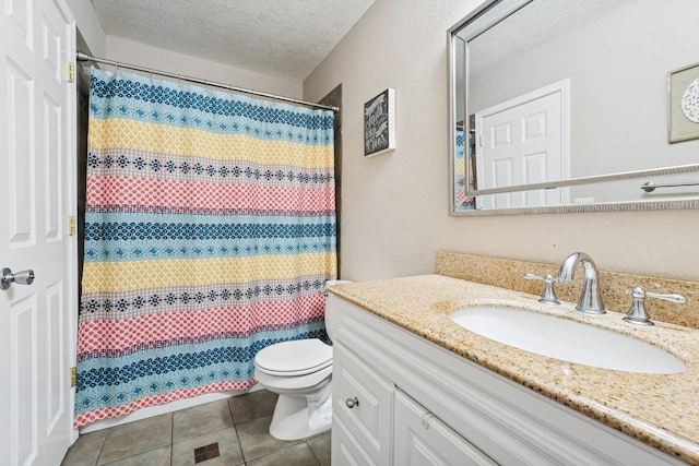 13967 Herald Ct, Apple Valley, MN 55124 - bathroom with vanity, toilet, a textured ceiling, tile patterned floors, and a shower with shower curtain