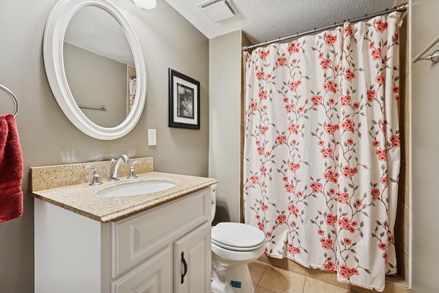 13967 Herald Ct, Apple Valley, MN 55124 - full bathroom with vanity, toilet, tile patterned floors, curtained shower, and a textured ceiling