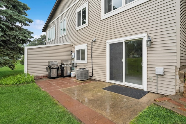 13967 Herald Ct, Apple Valley, MN 55124 - rear view of property featuring a patio, cooling unit, and a yard