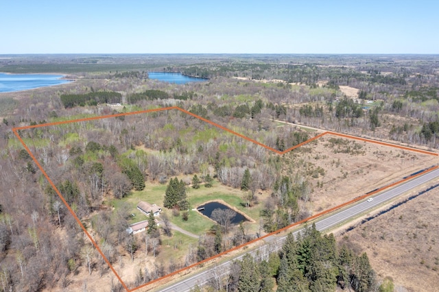 24944 State Highway 210, Mcgregor, MN 55760 - aerial overview of property's location with a large body of water, property parcel outlined, and a forest