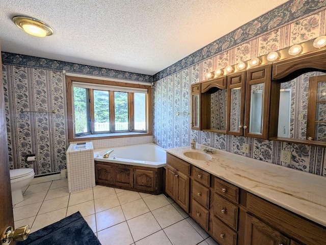 24944 State Highway 210, Mcgregor, MN 55760 - full bathroom featuring wallpapered walls, tile patterned flooring, a textured ceiling, toilet, and a garden tub