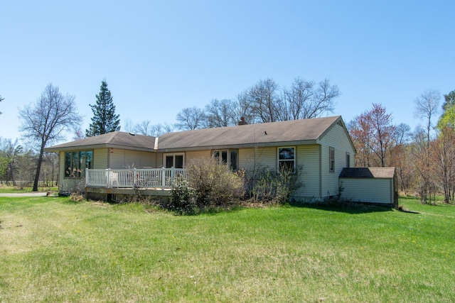 24944 State Highway 210, Mcgregor, MN 55760 - rear view of house featuring a deck, a yard, and a chimney
