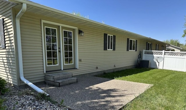 413 River Bluff Dr, Windom, MN 56101 - back of house with entry steps and cooling unit