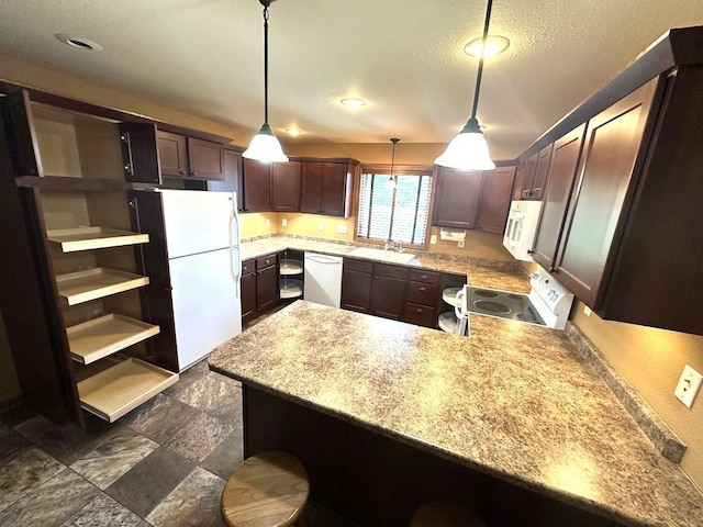 413 River Bluff Dr, Windom, MN 56101 - kitchen featuring white appliances, a peninsula, light countertops, and recessed lighting