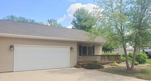 413 River Bluff Dr, Windom, MN 56101 - view of front facade featuring a porch, driveway, a garage, and roof with shingles