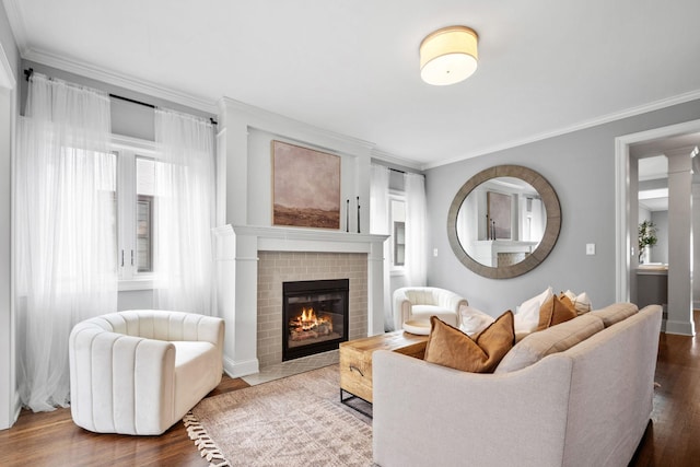 5220 Abbott Ave S, Minneapolis, MN 55410 - living area featuring crown molding, wood finished floors, a fireplace, and baseboards