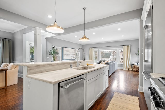 5220 Abbott Ave S, Minneapolis, MN 55410 - kitchen featuring a sink, stainless steel appliances, open floor plan, recessed lighting, and dark wood-style floors