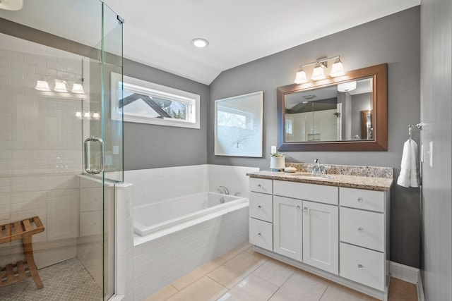 5220 Abbott Ave S, Minneapolis, MN 55410 - full bathroom with a bath, a shower stall, vanity, and tile patterned flooring