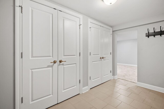 5220 Abbott Ave S, Minneapolis, MN 55410 - unfurnished bedroom with baseboards and multiple closets