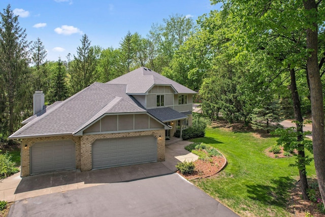 12005 27th Ave N, Plymouth, MN 55441 - view of front of house featuring brick siding, roof with shingles, asphalt driveway, and a garage