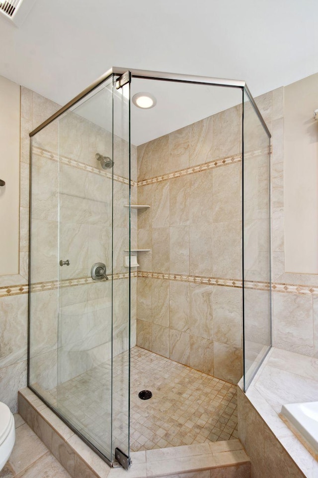 12005 27th Ave N, Plymouth, MN 55441 - full bath with a shower stall, a garden tub, and toilet