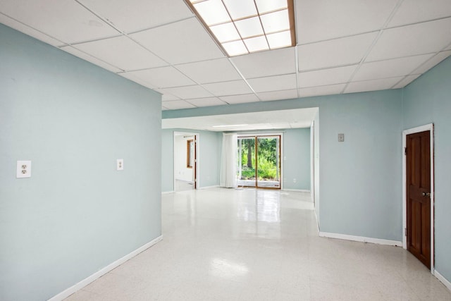 12005 27th Ave N, Plymouth, MN 55441 - unfurnished room with a drop ceiling, baseboards, and light flooring