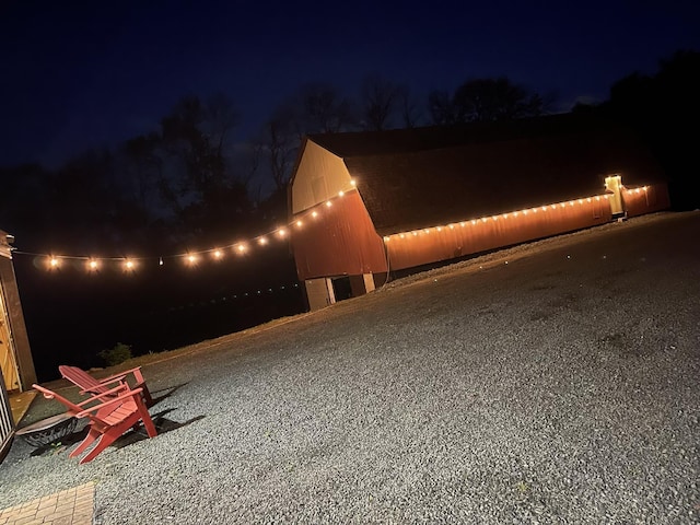 15947 Scandia Trl N, Scandia, MN 55073 - property exterior at twilight with a barn and an outdoor structure
