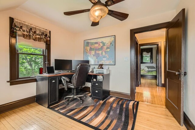 15947 Scandia Trl N, Scandia, MN 55073 - home office with hardwood / wood-style floors, baseboards, ceiling fan, and lofted ceiling