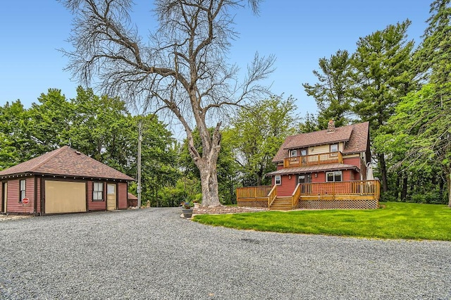 15947 Scandia Trl N, Scandia, MN 55073 - view of front of property featuring a front lawn, a deck, a garage, and a chimney