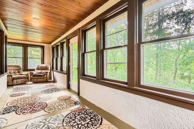 15947 Scandia Trl N, Scandia, MN 55073 - sunroom with plenty of natural light, a textured wall, and wood ceiling
