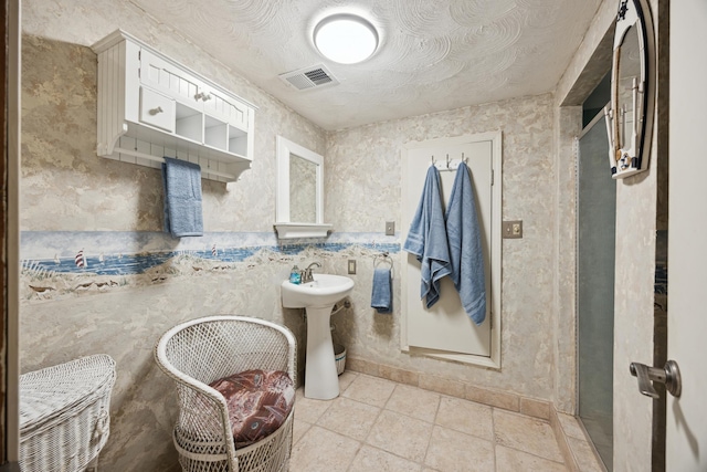 3704 Milton St N, Shoreview, MN 55126 - bathroom featuring tile patterned flooring and a textured ceiling