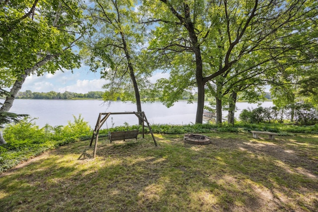 3704 Milton St N, Shoreview, MN 55126 - view of yard featuring a fire pit and a water view