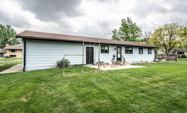 1336 Fairview Ln, Farmington, MN 55024 - back of house with a patio area and a yard