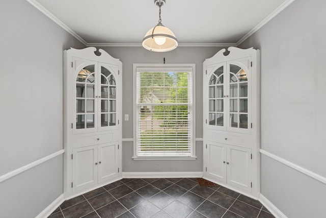4150 Beard Ave N, Robbinsdale, MN 55422 - entryway with dark tile patterned flooring and crown molding