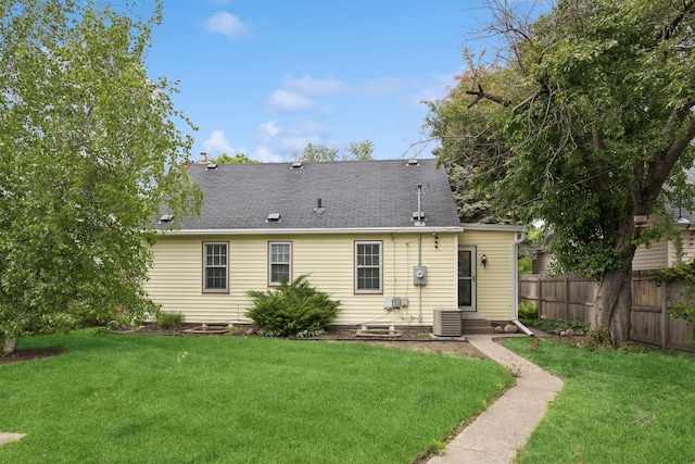 4150 Beard Ave N, Robbinsdale, MN 55422 - rear view of property featuring a shingled roof