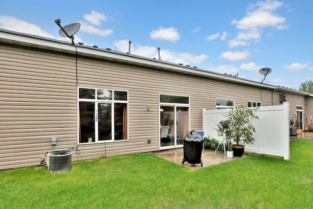 2171 Cleveland Way S, Cambridge, MN 55008 - rear view of house featuring central AC unit and a patio area