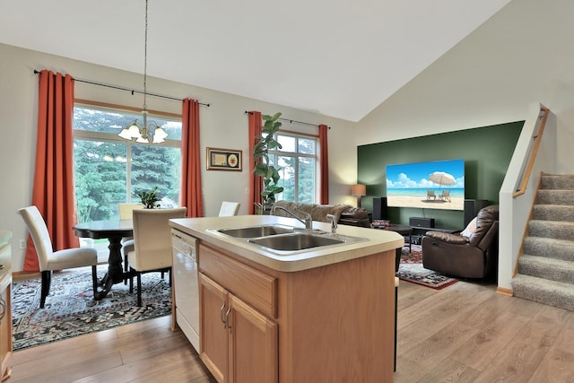 2171 Cleveland Way S, Cambridge, MN 55008 - kitchen with a sink, open floor plan, a chandelier, light wood-style floors, and light countertops