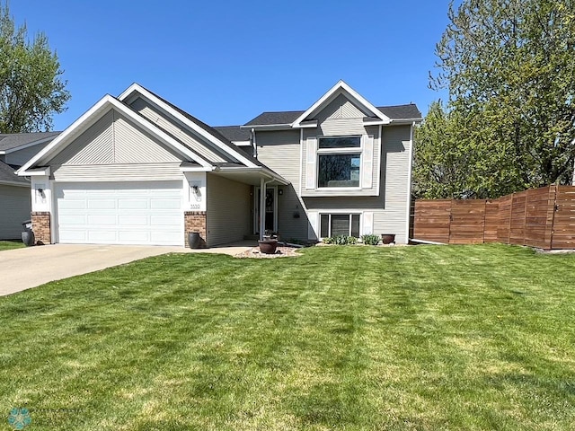 view of front of property with a garage, concrete driveway, and brick siding