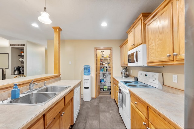 5678 Sherman Oaks Rd, Stacy, MN 55079 - kitchen featuring white appliances, light countertops, hanging light fixtures, and recessed lighting