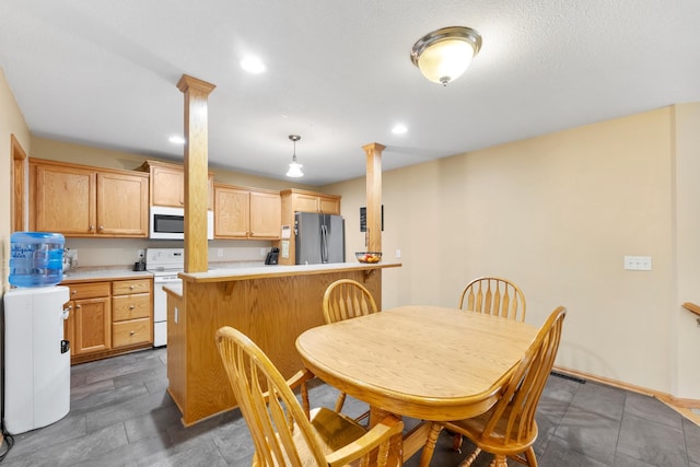 5678 Sherman Oaks Rd, Stacy, MN 55079 - dining room featuring decorative columns and recessed lighting