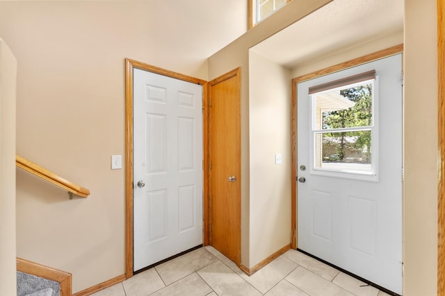 5678 Sherman Oaks Rd, Stacy, MN 55079 - foyer entrance featuring light tile patterned floors and stairs