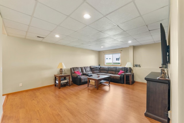 5678 Sherman Oaks Rd, Stacy, MN 55079 - living area featuring light wood finished floors and a paneled ceiling