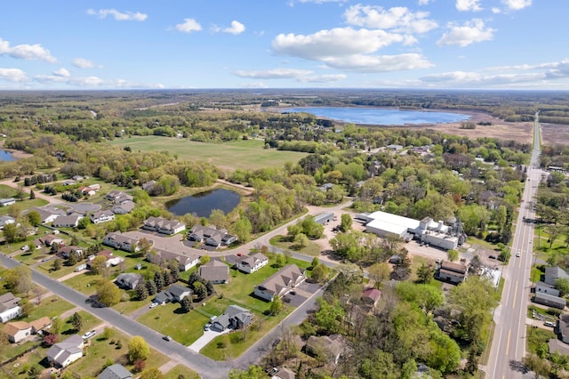 5678 Sherman Oaks Rd, Stacy, MN 55079 - aerial view of residential area with a nearby body of water and a forest