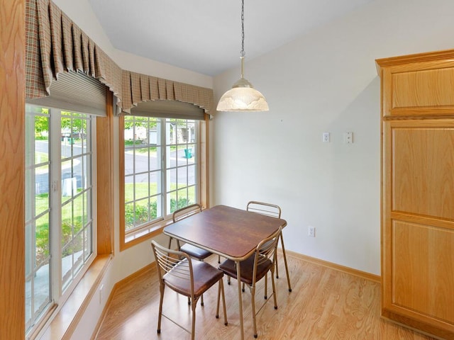 663 Regent Ln, Waconia, MN 55387 - dining space featuring light wood-style flooring and baseboards