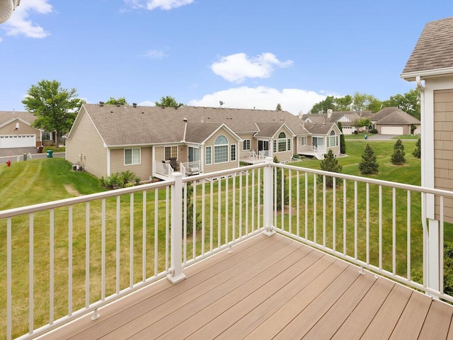 663 Regent Ln, Waconia, MN 55387 - wooden deck featuring a residential view and a lawn