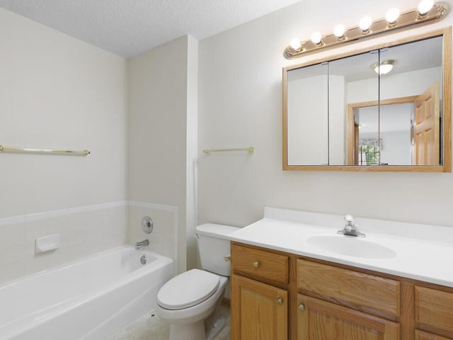 663 Regent Ln, Waconia, MN 55387 - bathroom with a garden tub, vanity, toilet, and a textured ceiling