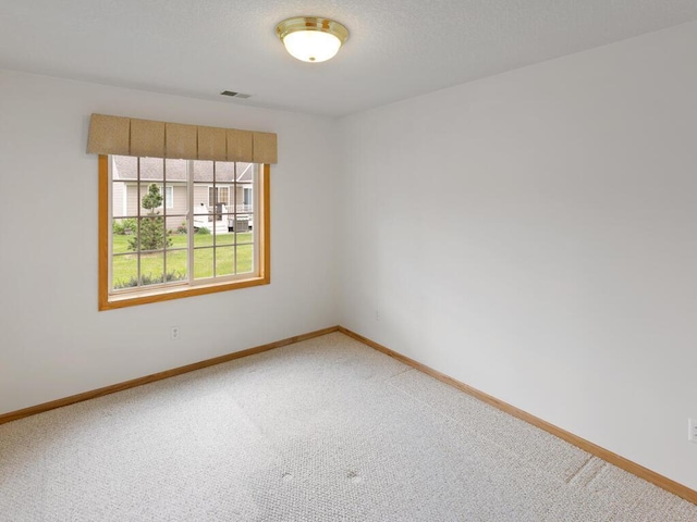 663 Regent Ln, Waconia, MN 55387 - carpeted spare room with baseboards
