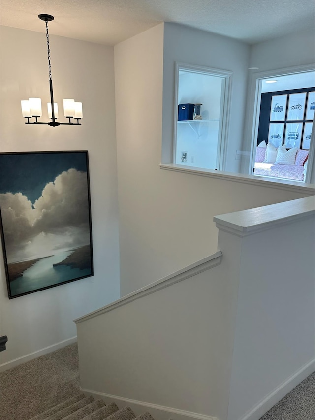 14536 74th St NE, Otsego, MN 55330 - stairs featuring carpet floors, a chandelier, and baseboards
