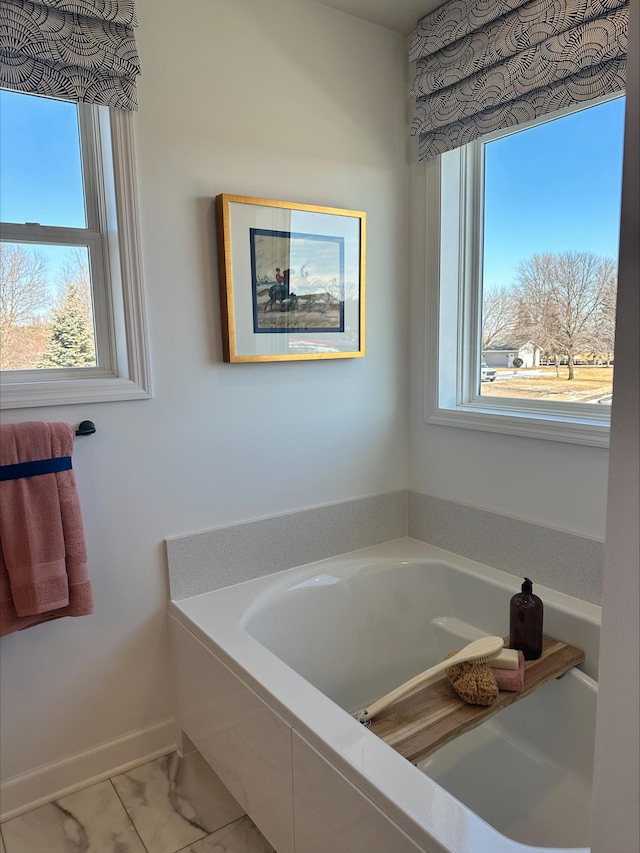 14536 74th St NE, Otsego, MN 55330 - full bath with plenty of natural light, a garden tub, and baseboards