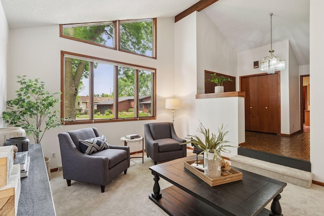 3291 Hillsboro Ave S, Saint Louis Park, MN 55426 - carpeted living room featuring a chandelier, high vaulted ceiling, and beam ceiling