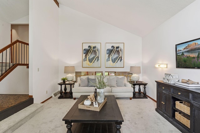 3291 Hillsboro Ave S, Saint Louis Park, MN 55426 - living area with carpet, high vaulted ceiling, and stairway