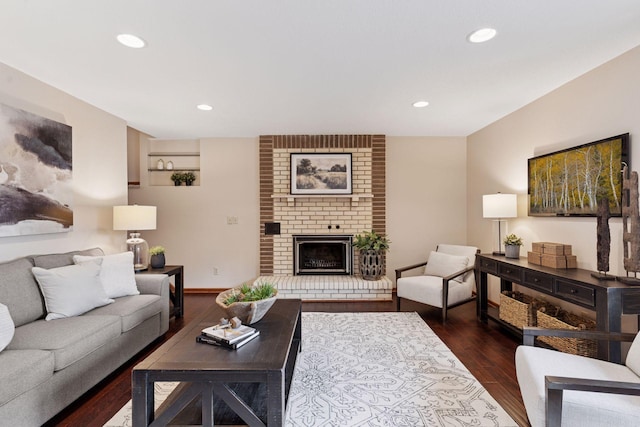 3291 Hillsboro Ave S, Saint Louis Park, MN 55426 - living area with wood finished floors, a brick fireplace, and recessed lighting