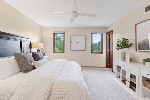 3291 Hillsboro Ave S, Saint Louis Park, MN 55426 - bedroom with light carpet, a ceiling fan, and a textured ceiling