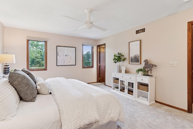 3291 Hillsboro Ave S, Saint Louis Park, MN 55426 - bedroom with light colored carpet, ceiling fan, and a textured ceiling