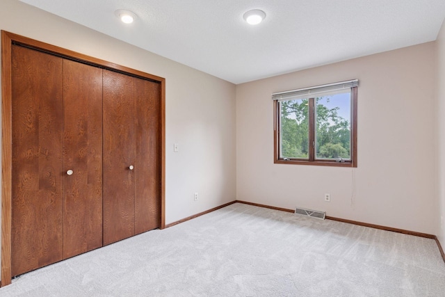 3291 Hillsboro Ave S, Saint Louis Park, MN 55426 - unfurnished bedroom with a closet and light carpet