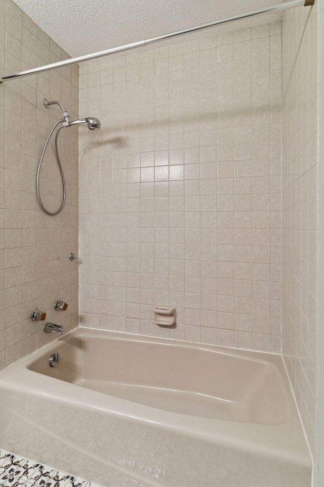 3291 Hillsboro Ave S, Saint Louis Park, MN 55426 - bathroom with bathing tub / shower combination and a textured ceiling
