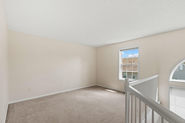 1353 White Oak Dr, Chaska, MN 55318 - carpeted empty room featuring baseboards