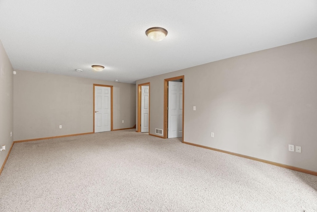 1353 White Oak Dr, Chaska, MN 55318 - carpeted empty room with baseboards